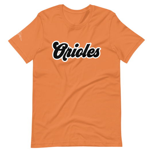 Burnt Orange St. Louis Park Orioles Park T shirt with geometric white bird on sleeve